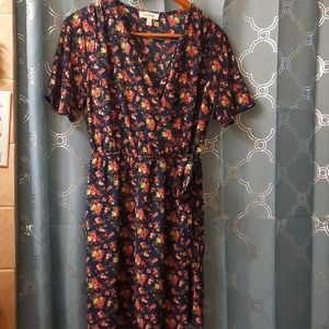 Monteau Las Angeles navy and floral dress ties at the waist. Med